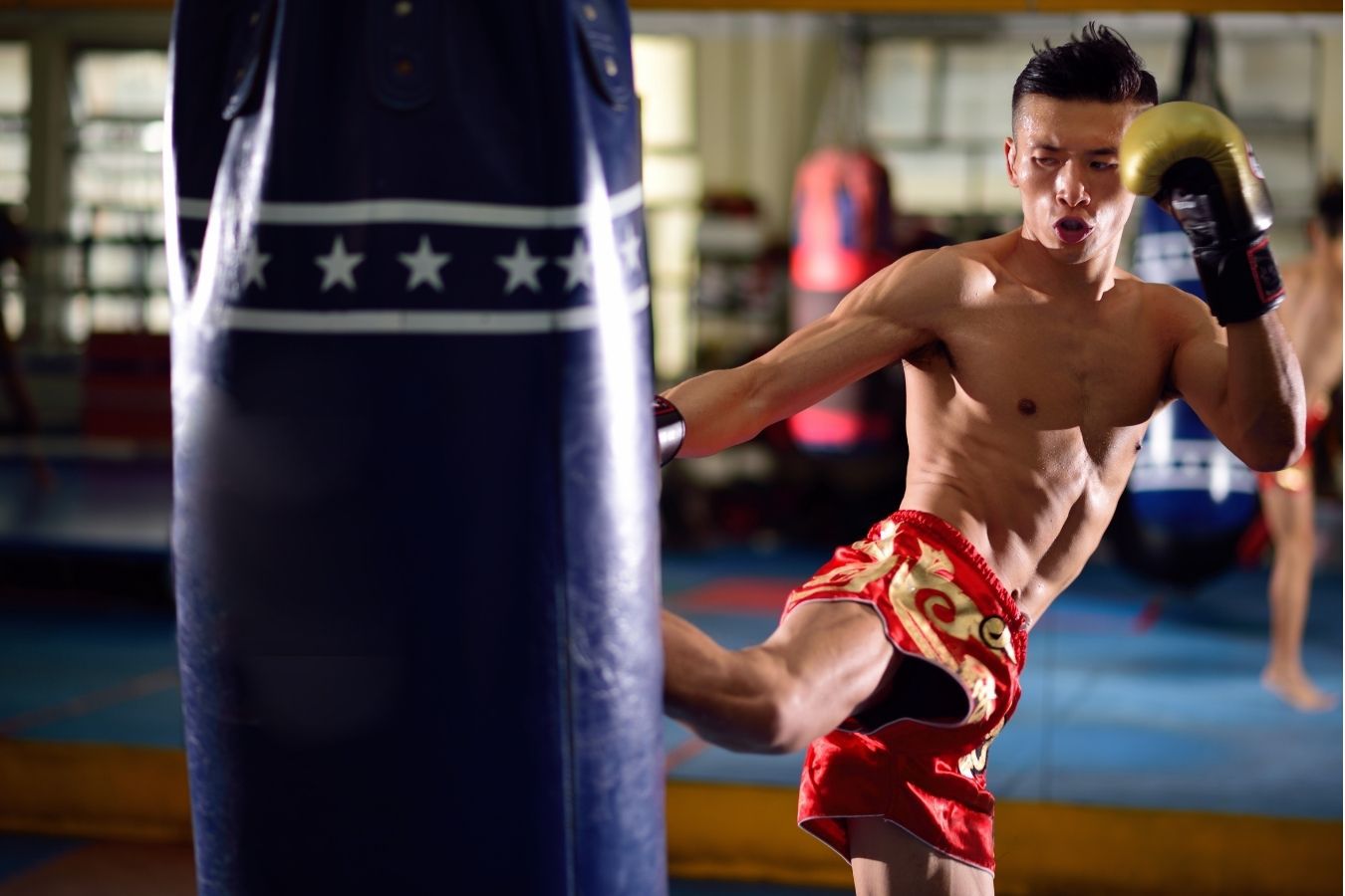 Muay Thai Fighter Kicking Bag for cardio and conditioning